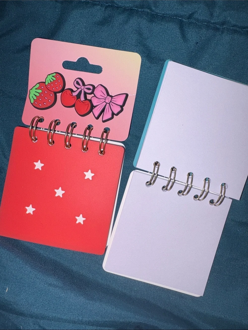 Cute croc-like charms with mini note pads sets.  Can be used on other stuff